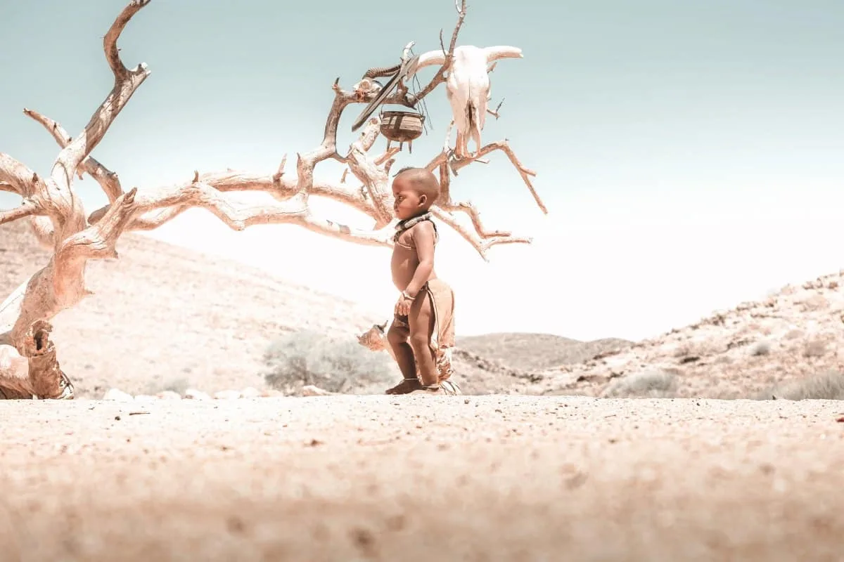 Himba Child standing in Kaokoveld Namibia