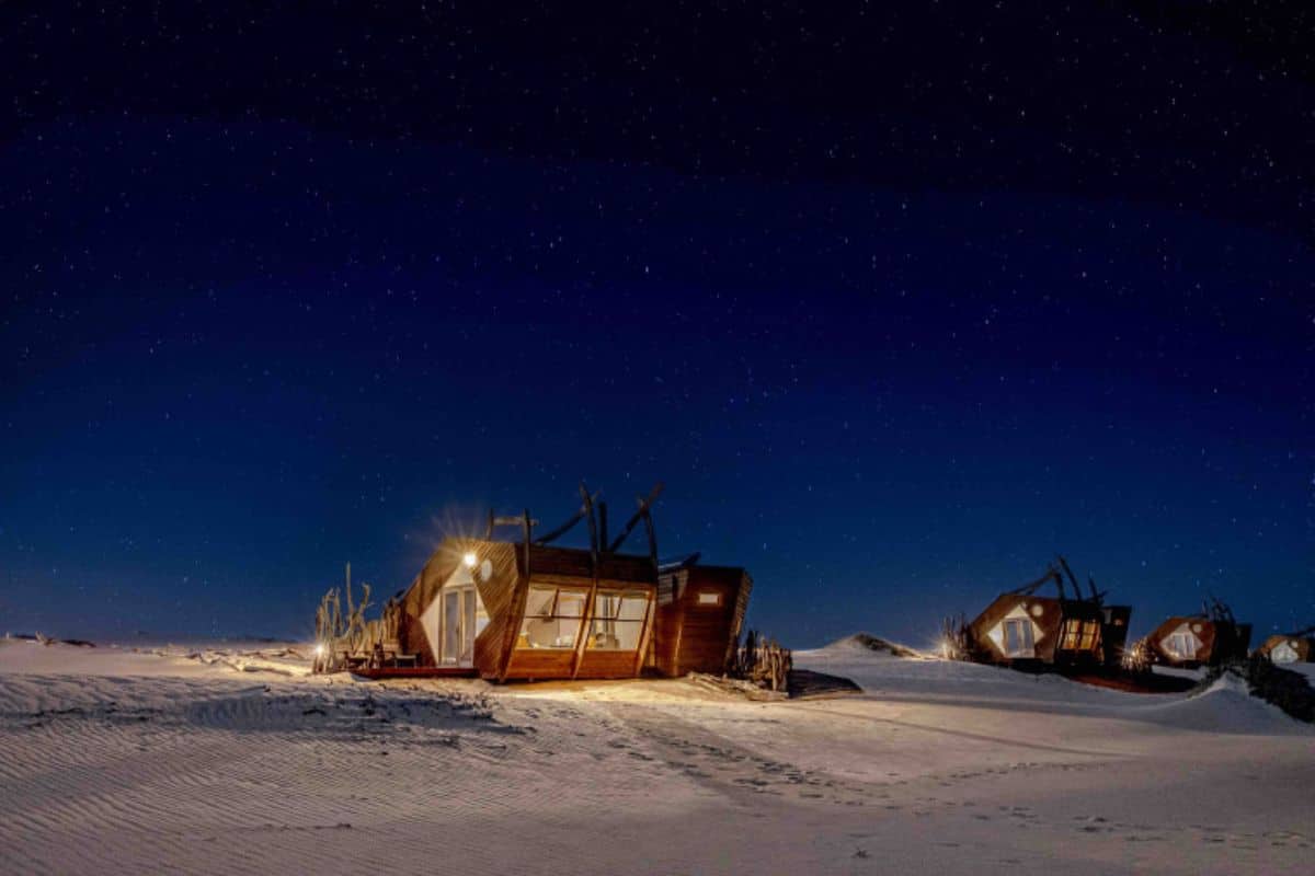 Cabins of Shipwreck Lodge on the dunes of the Skeleton Coast, Namibia