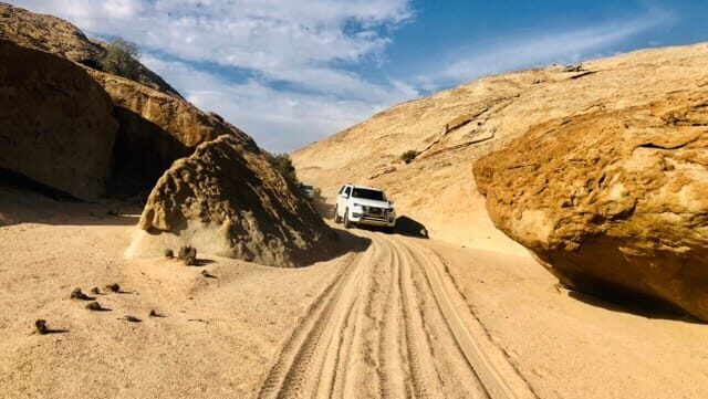 A vehicle on a rough Namibian track
