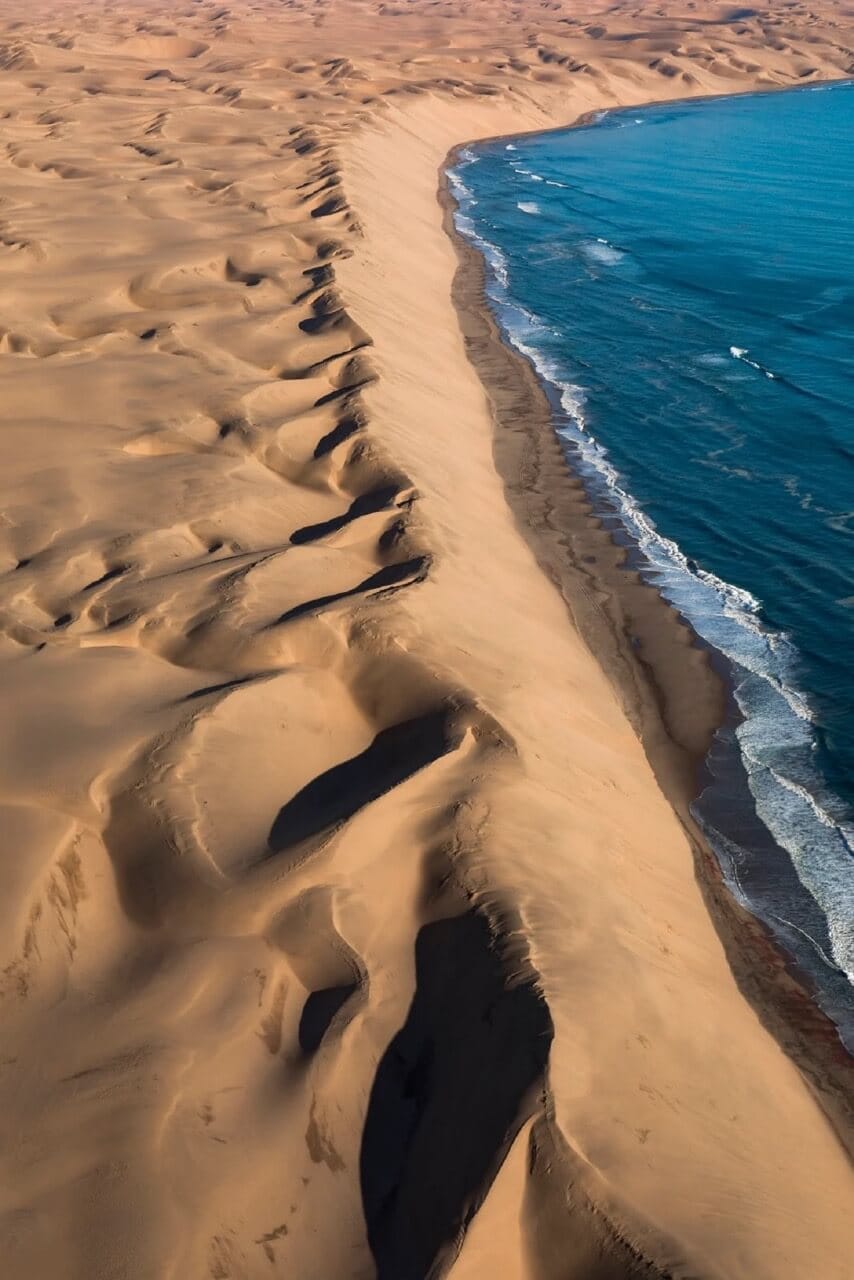 Aerial view of dunes running down to the Atlantic shoreline