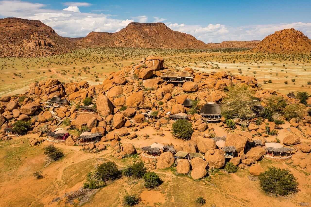 Family lodge chalet among granite boulders in Damaraland, Namibia